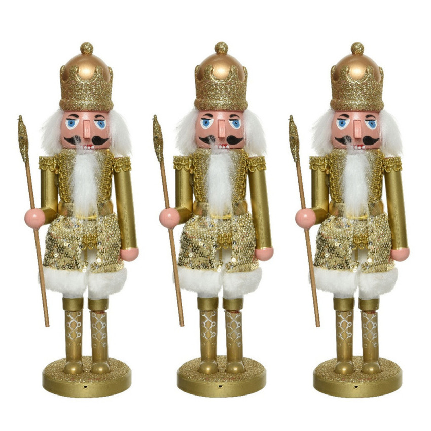 3x stuks kerstbeeldjes kunststof notenkraker poppetjes-soldaten goud 28 cm kerstbeeldjes